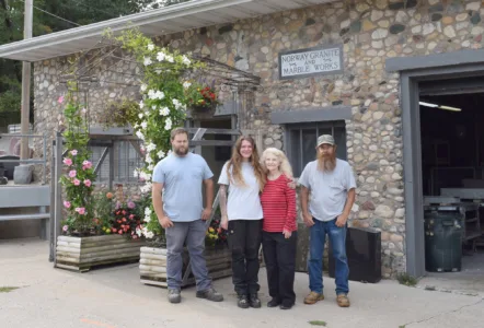 Generations team up to keep Norway Granite in community
